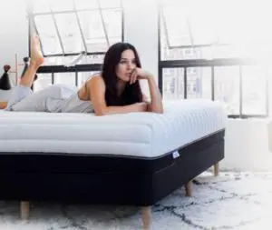 Luxi mattress - girl on bed