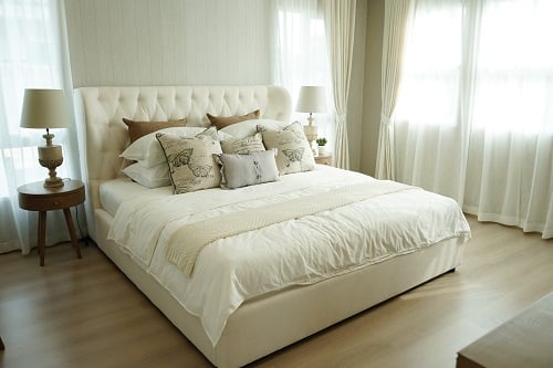 Combination Pillows On White Bed