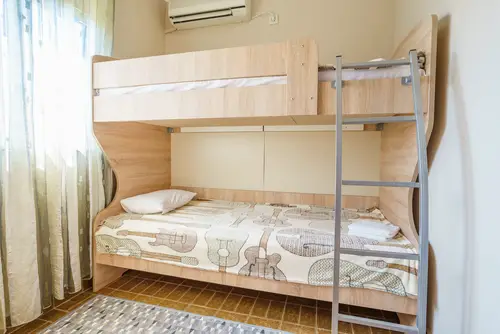 Two-Tier Farmhouse Bunk Bed with Stairs 