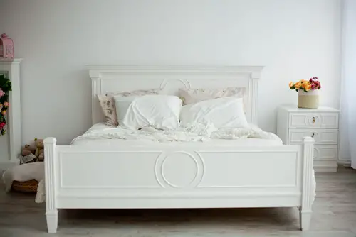 White Wooden Bed in White Bedroom