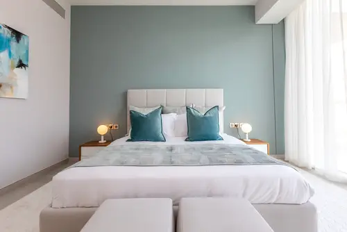 Contemporary Teal Bedroom with Accent Pillows