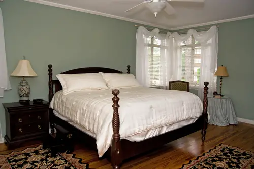 Traditional Teal Bedroom with Antique furniture
