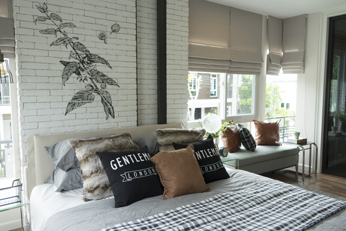 Farmhouse Gray Bedroom with Brick Wall Design