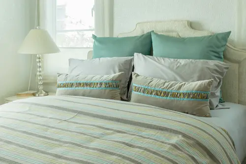 Traditional Teal Bedroom with Accented Color 
