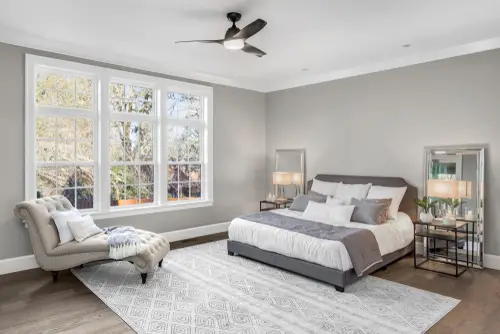 Traditional Gray Bedroom with Natural Light