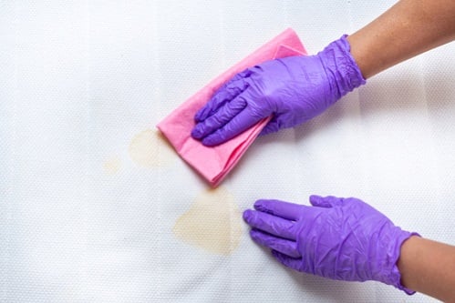 how to clean vomit from mattress