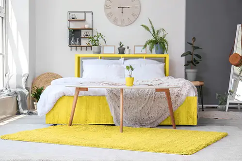 Boho Chic Bedrooms in Lemon Yellow with Recycled Bed