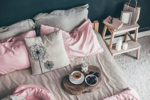 Industrial Bedrooms in Blush Pink with Accent Pillows