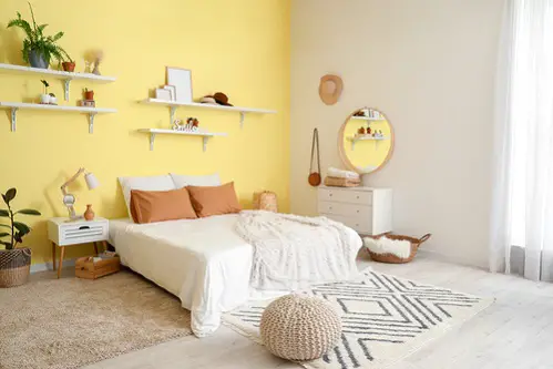Beach House Bedrooms in Lemon Yellow With Accent Wall