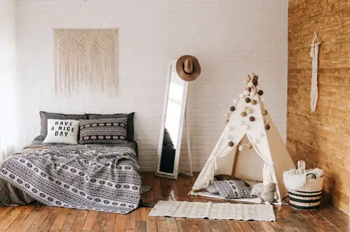 Boho Chic Bedrooms in Light Gray with Patterned Bed Sheets 