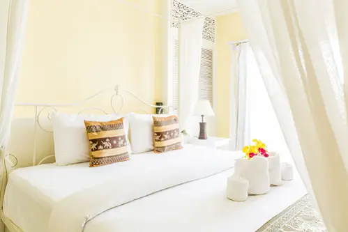 French Country Bedrooms in Lemon Yellow with Pretty Details