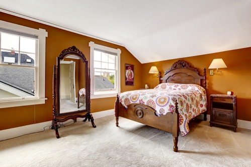 Traditional Bedrooms with Caramel Walls