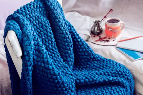 Rustic Bedrooms in Cobalt Blue with Knitted Blanket