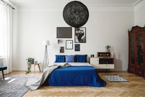 Industrial Bedrooms in Cobalt Blue with velvet Pillow And Blanket